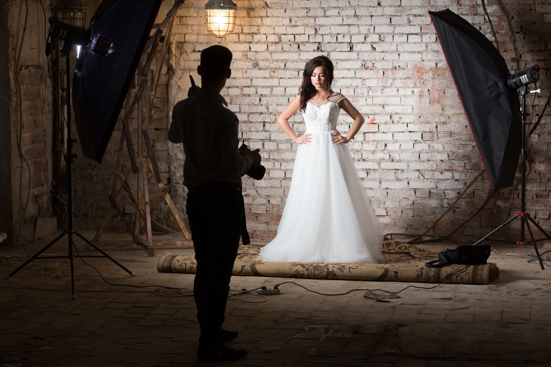 Photographing Of Fashion Model In Wedding Dress. Creative Process