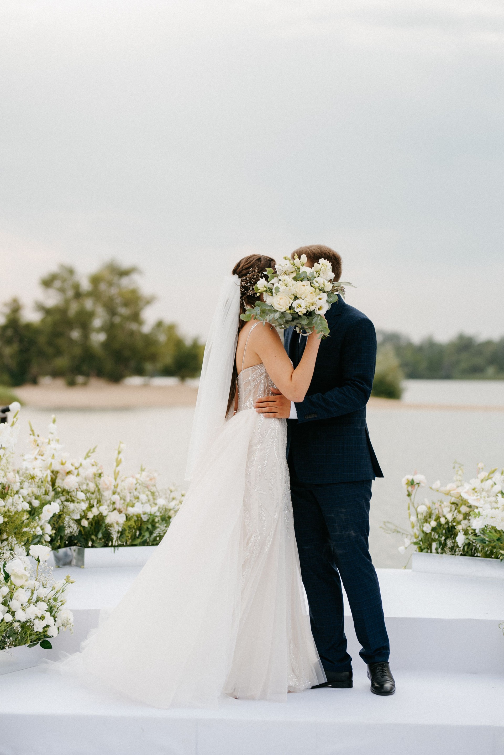 wedding ceremony of the newlyweds on the pier